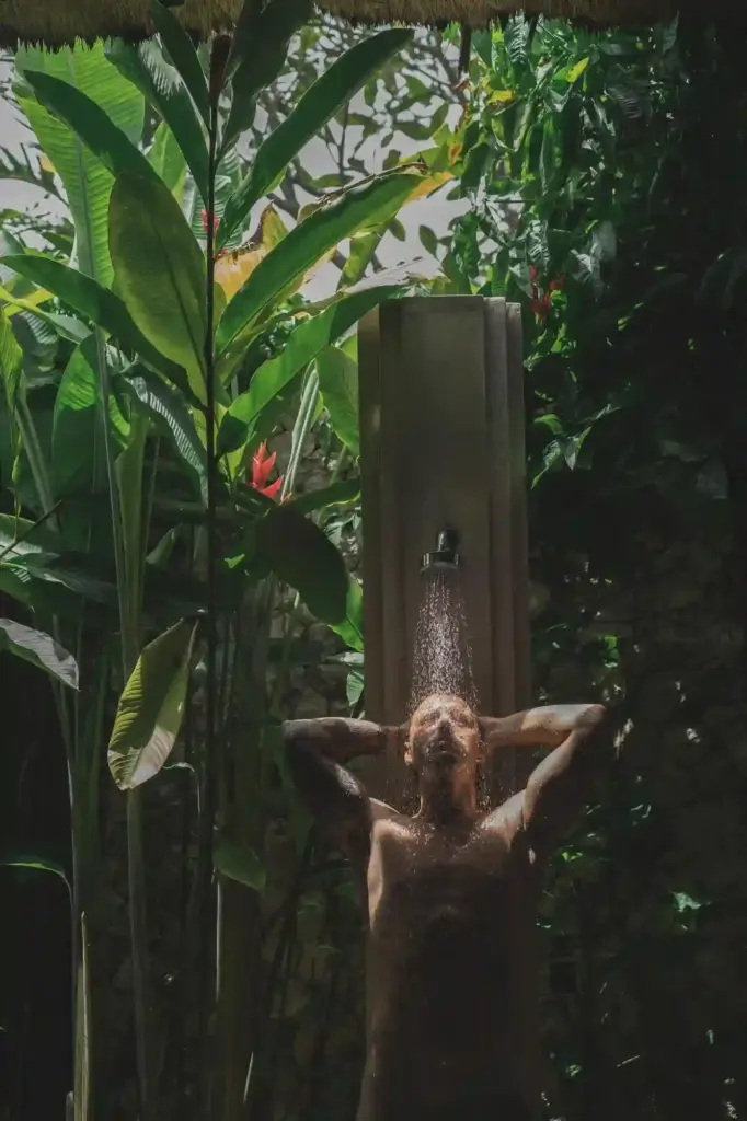 Man Relaxing in the Outdoor Shower